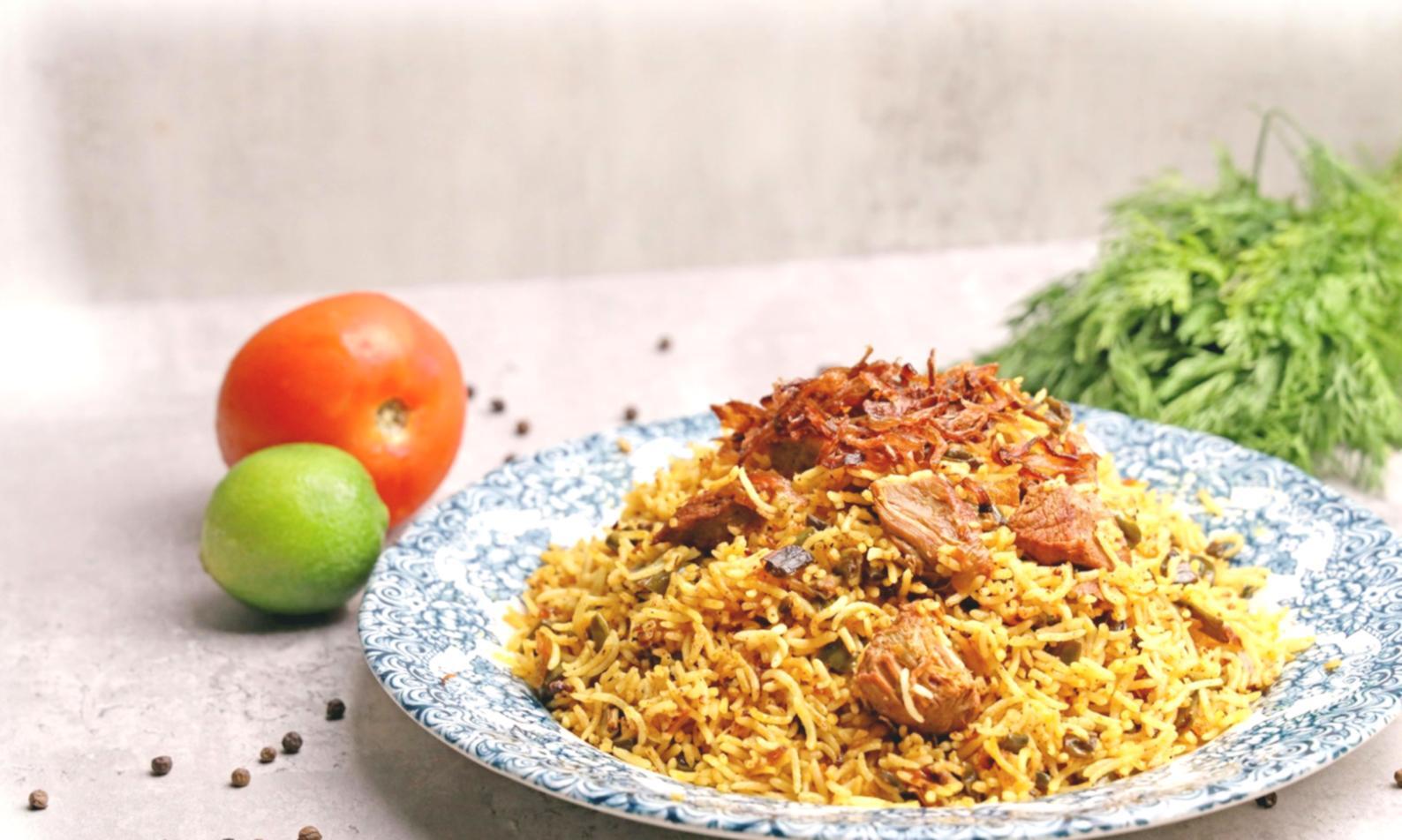 Display case filled with decorated cakes and layered desserts at Salvatore bakery